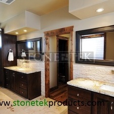 Travertine veneer.